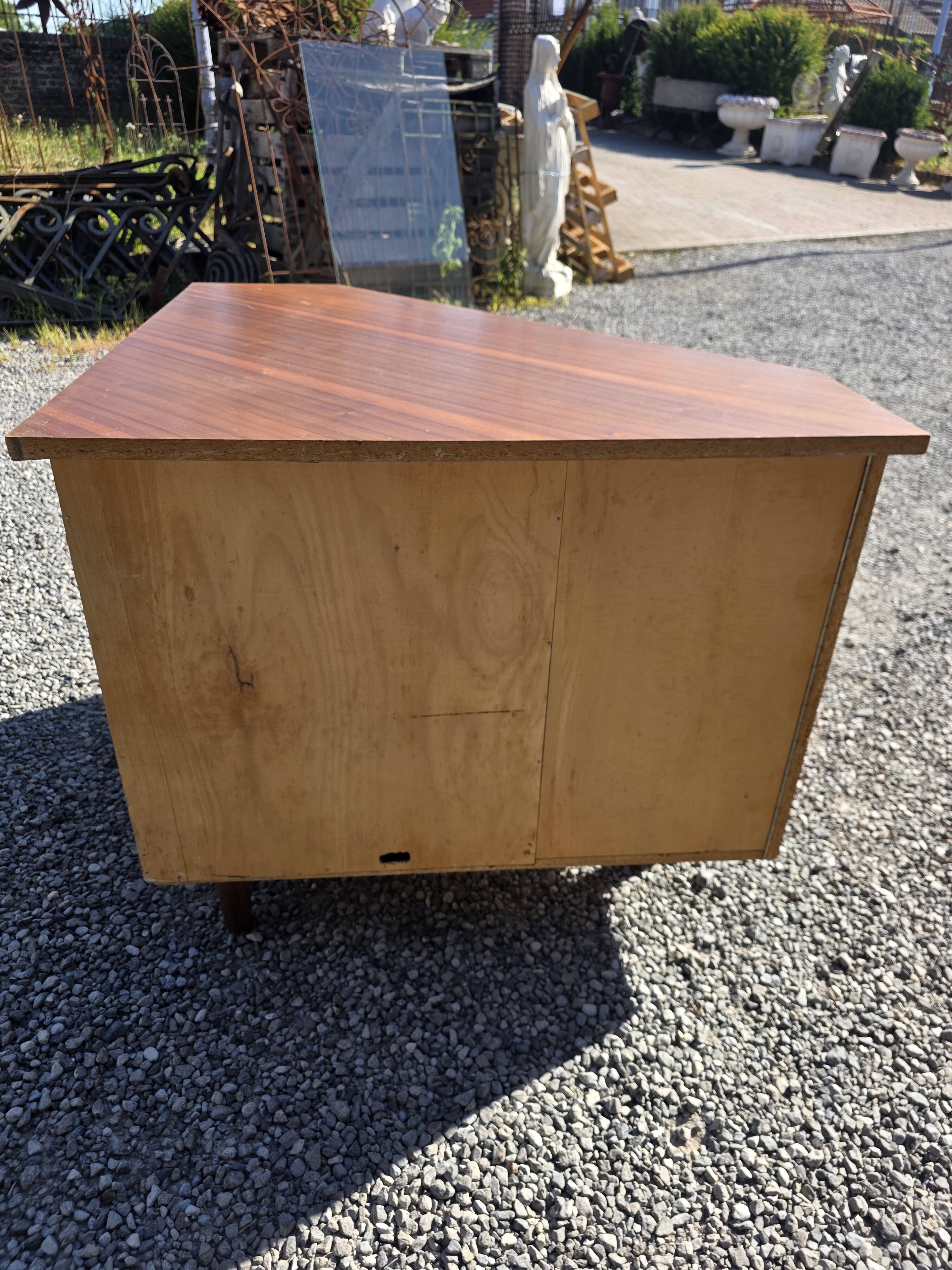Scandinavian corner unit in teak from the 1960s.