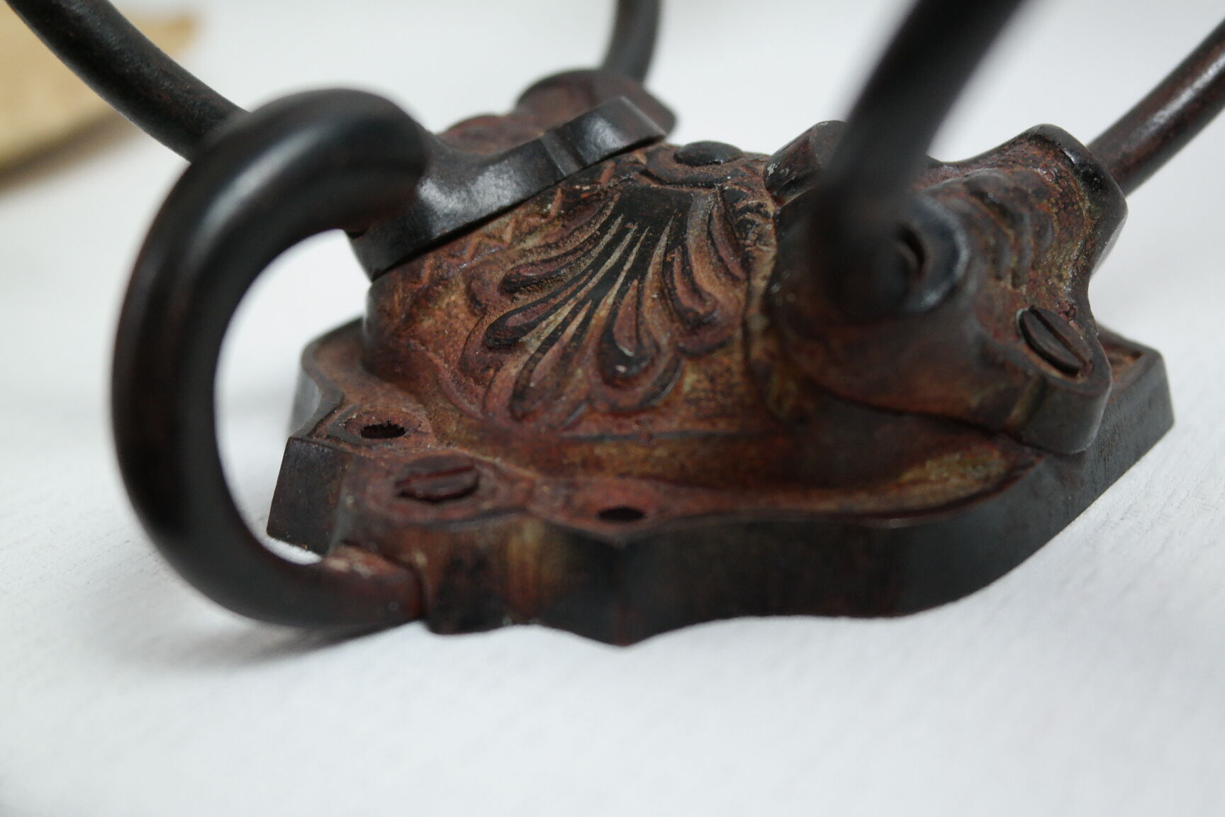 Old wall door in handmade cast iron signed