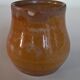 Creamy milk pot in sandstone