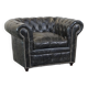 Spacious black cow leather chesterfield armchair with distinctive character
