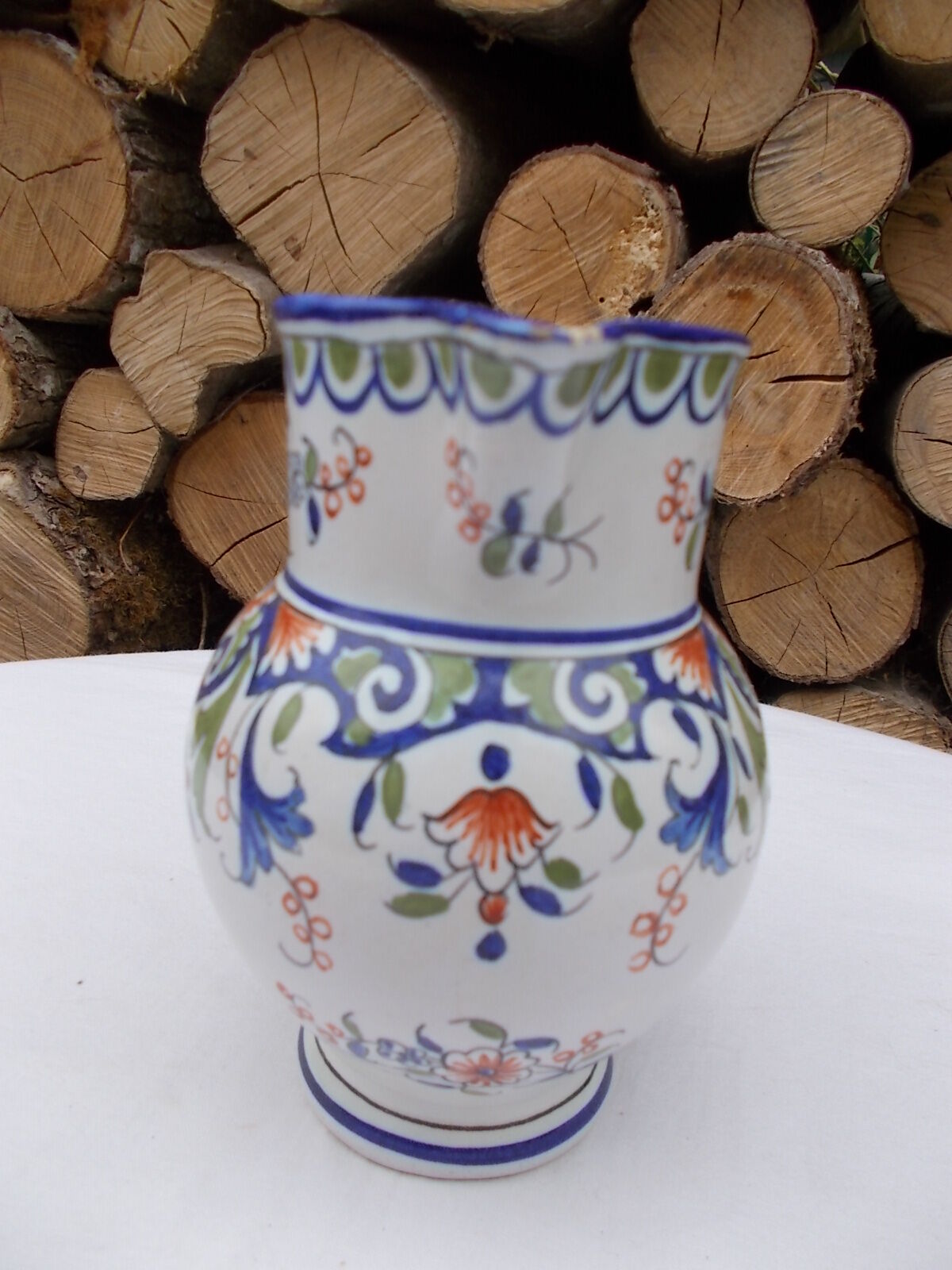 Decorated earthenware jug