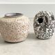 Composition of a small vintage ceramic vase and a ceramic owl figurine / statue