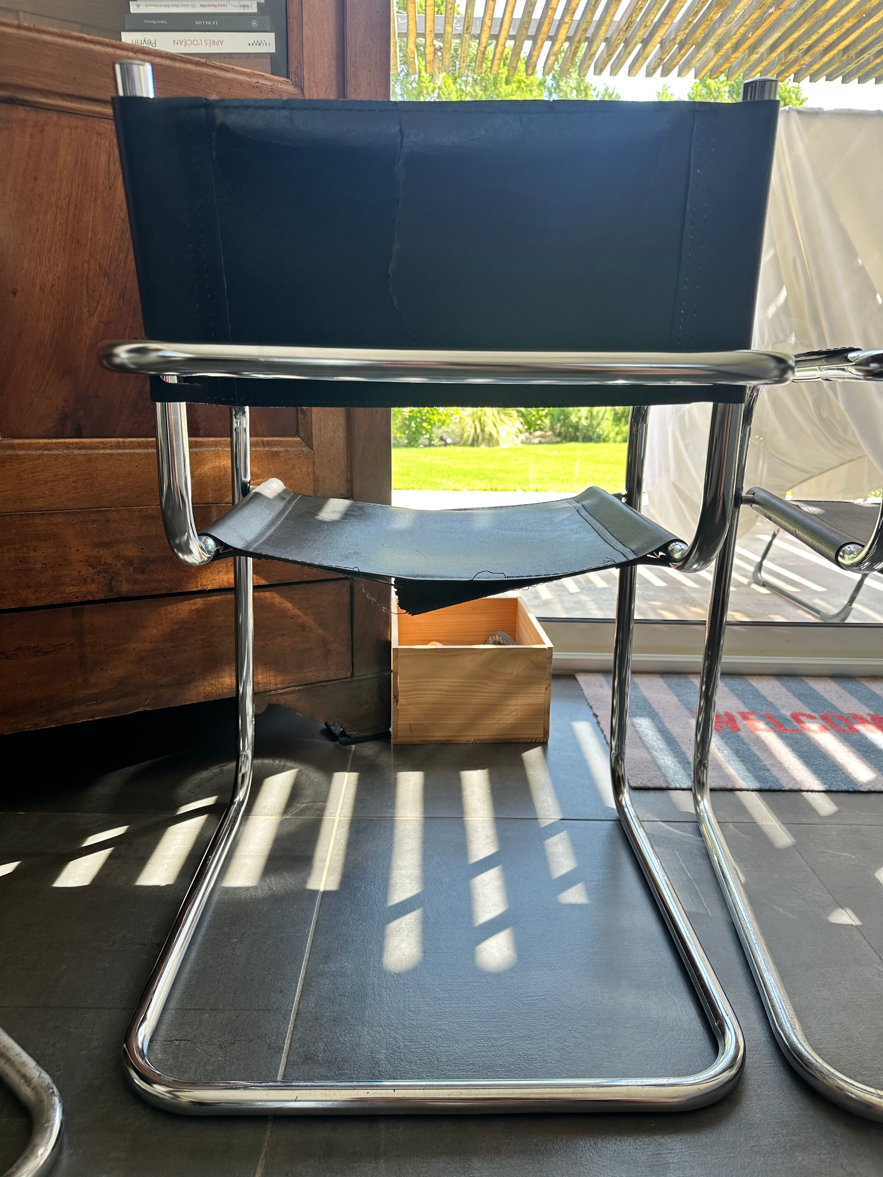 4 chrome tubular chairs