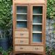 Armoire parisienne d’hôtel vitrée bois brut 1930