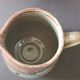 Stoneware pitcher from Alsace, incised decoration of vine by Louis Buecher 1986.