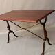 9 tables bistrot en bois et fer forgé, 1900