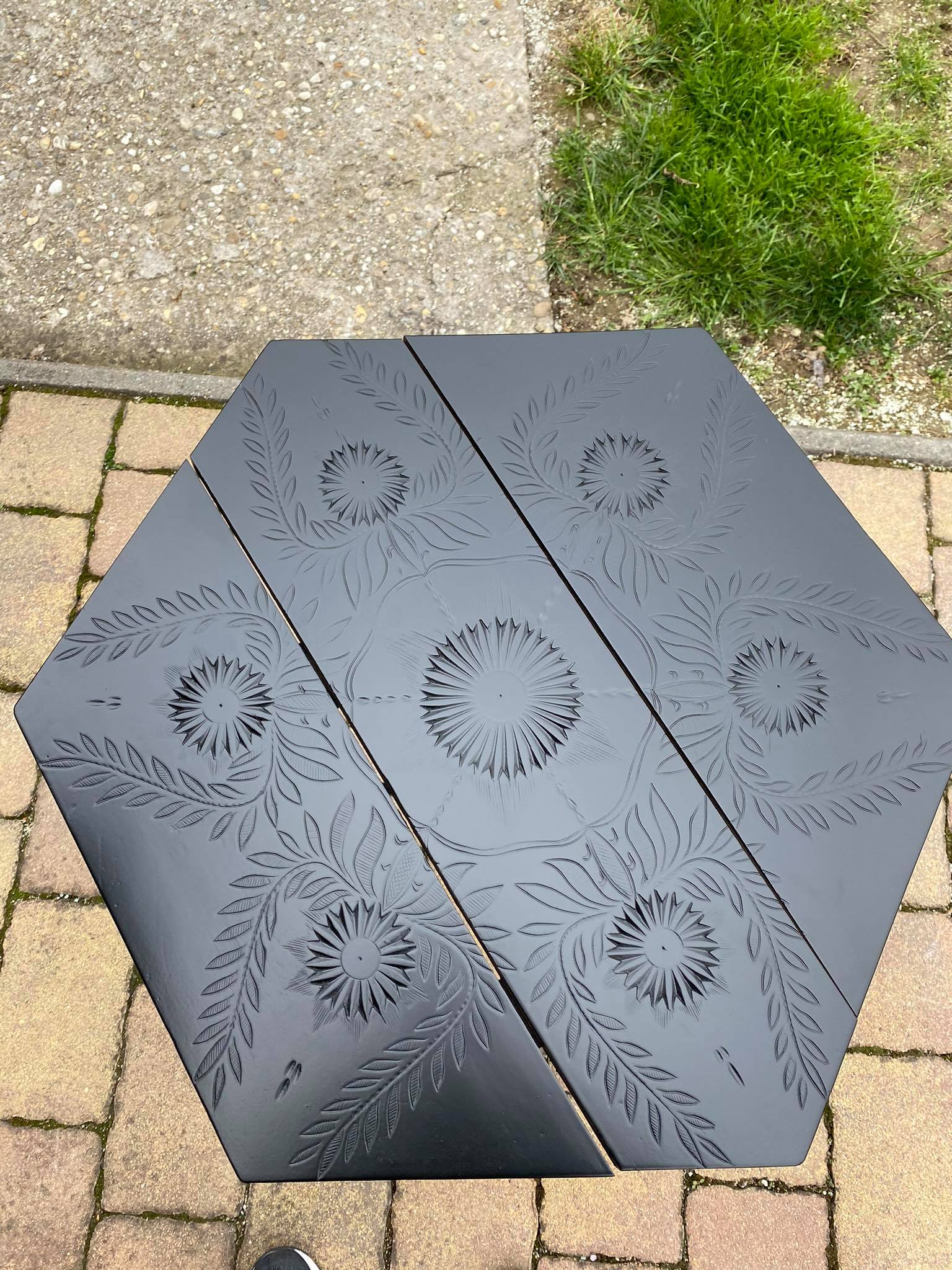 Hand painted black hexagon shaped occasional table.