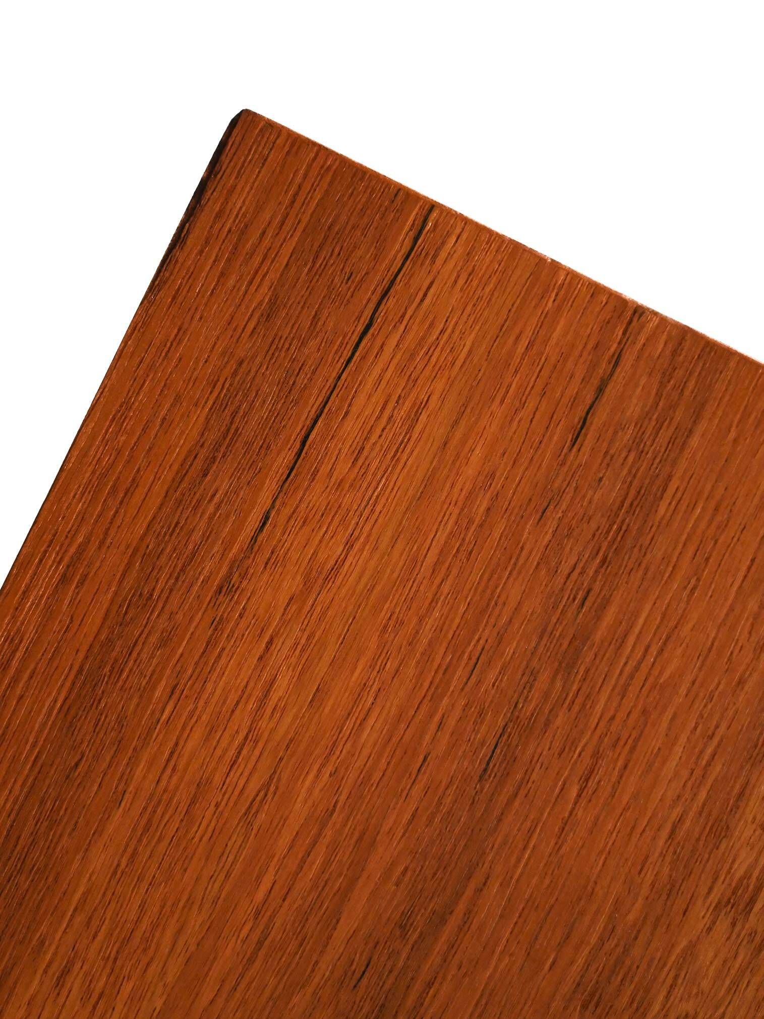Scandinavian Chest of Drawers in teak with turned birch legs, 1950s