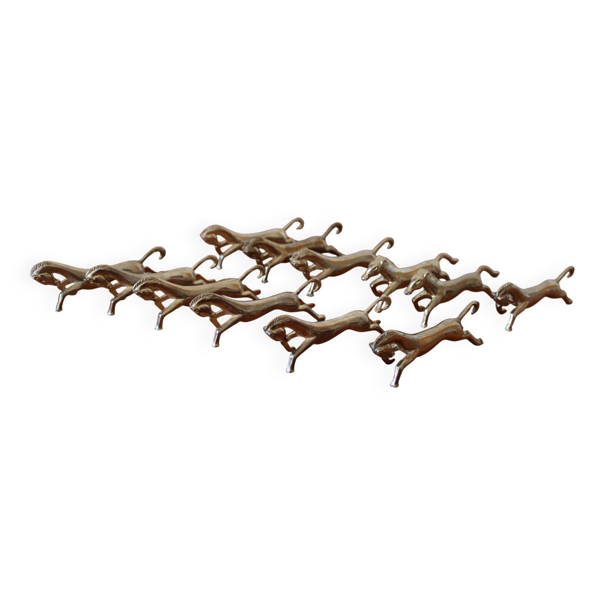 Set of 12 vintage knife rests, in silver metal