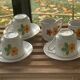 Porcelain dinette for dolls consisting of a coffee maker, cups and saucers, vintage