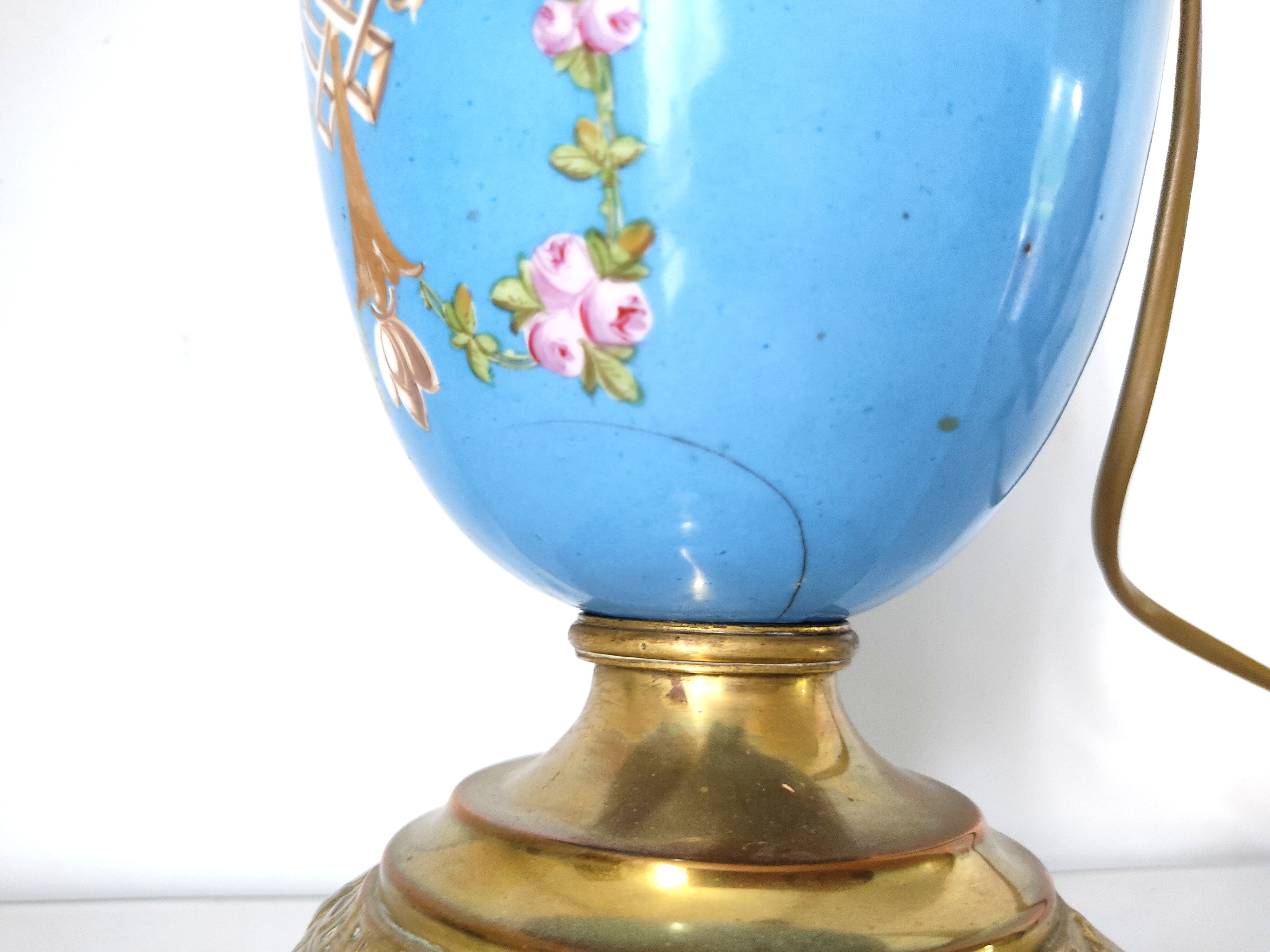 Lamp foot blue vase heads of fauna