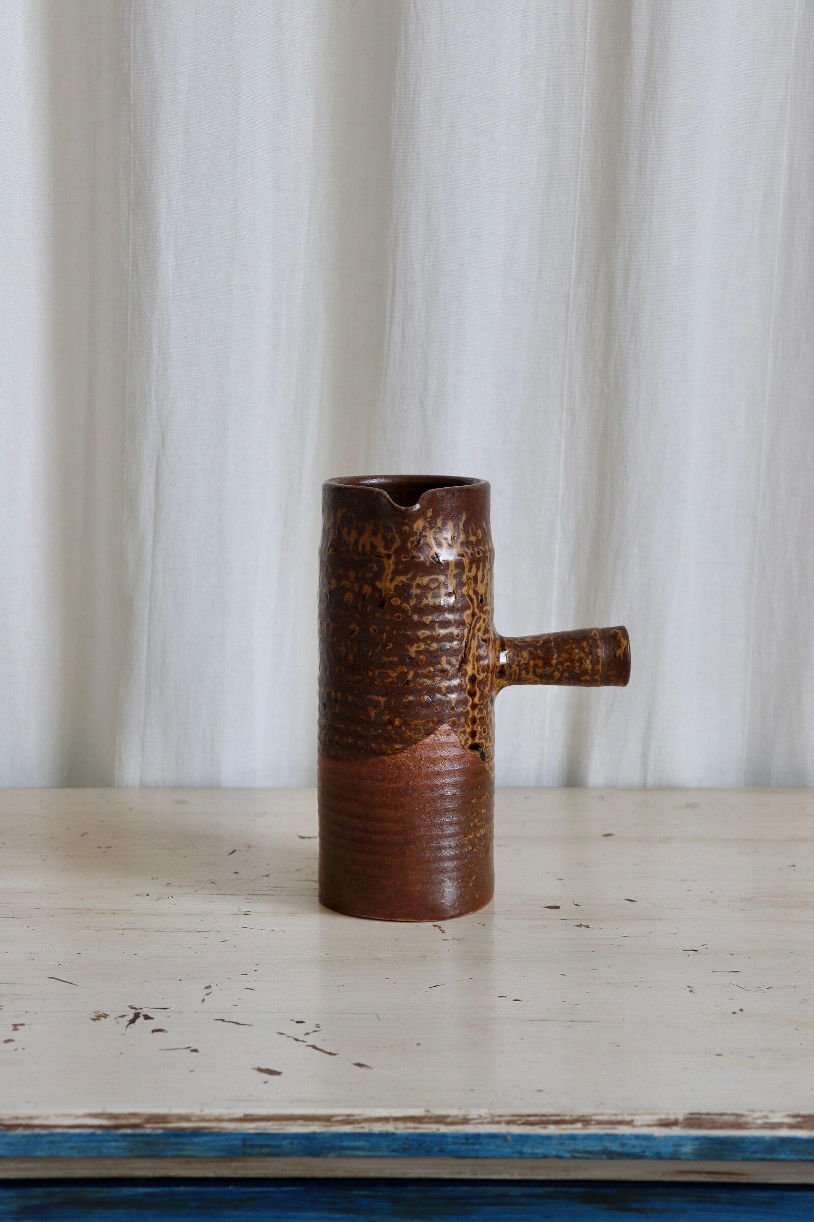 Textured stoneware decanter