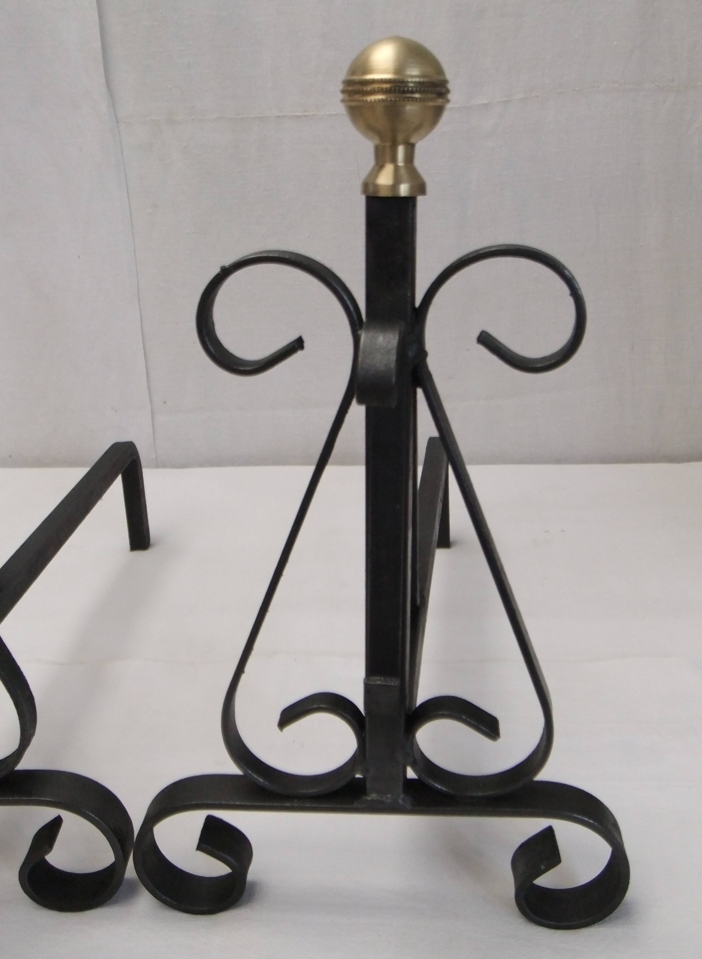 Antique pair of cast iron andirons wrought iron and bronze fireplace accessory