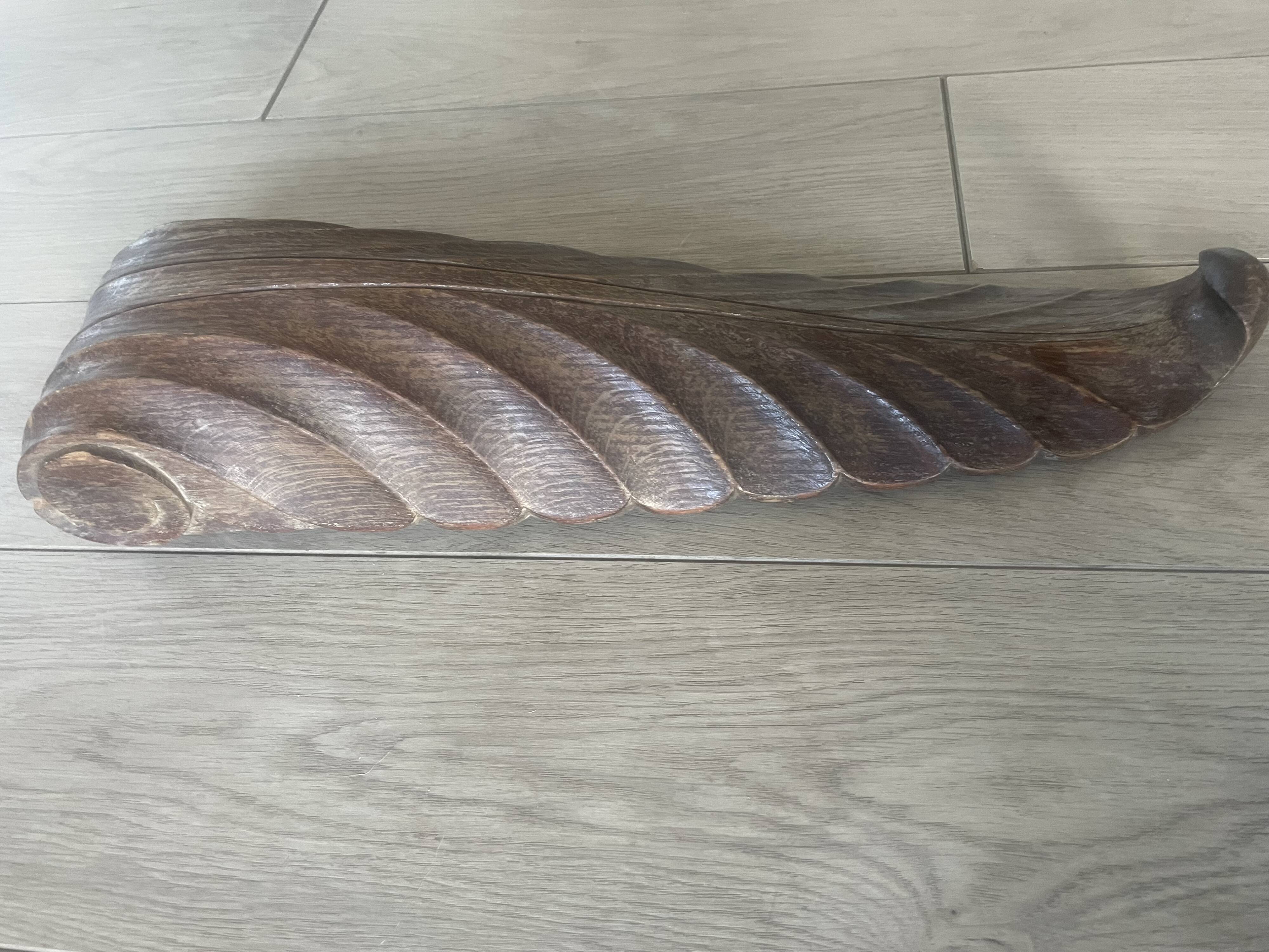 four decorative carved wooden objects