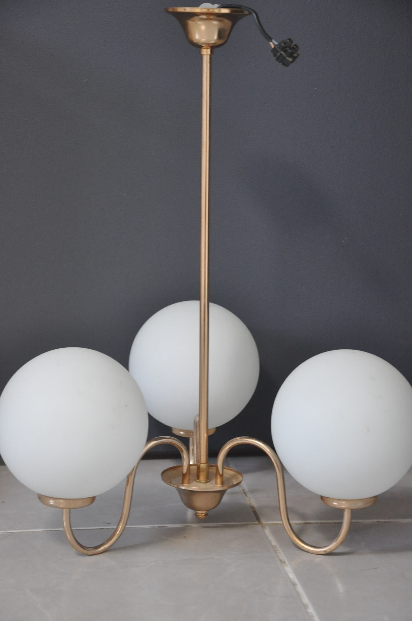 Brass and opaline luster