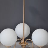 Brass and opaline luster