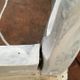 Former foot, skated in white wooden rest