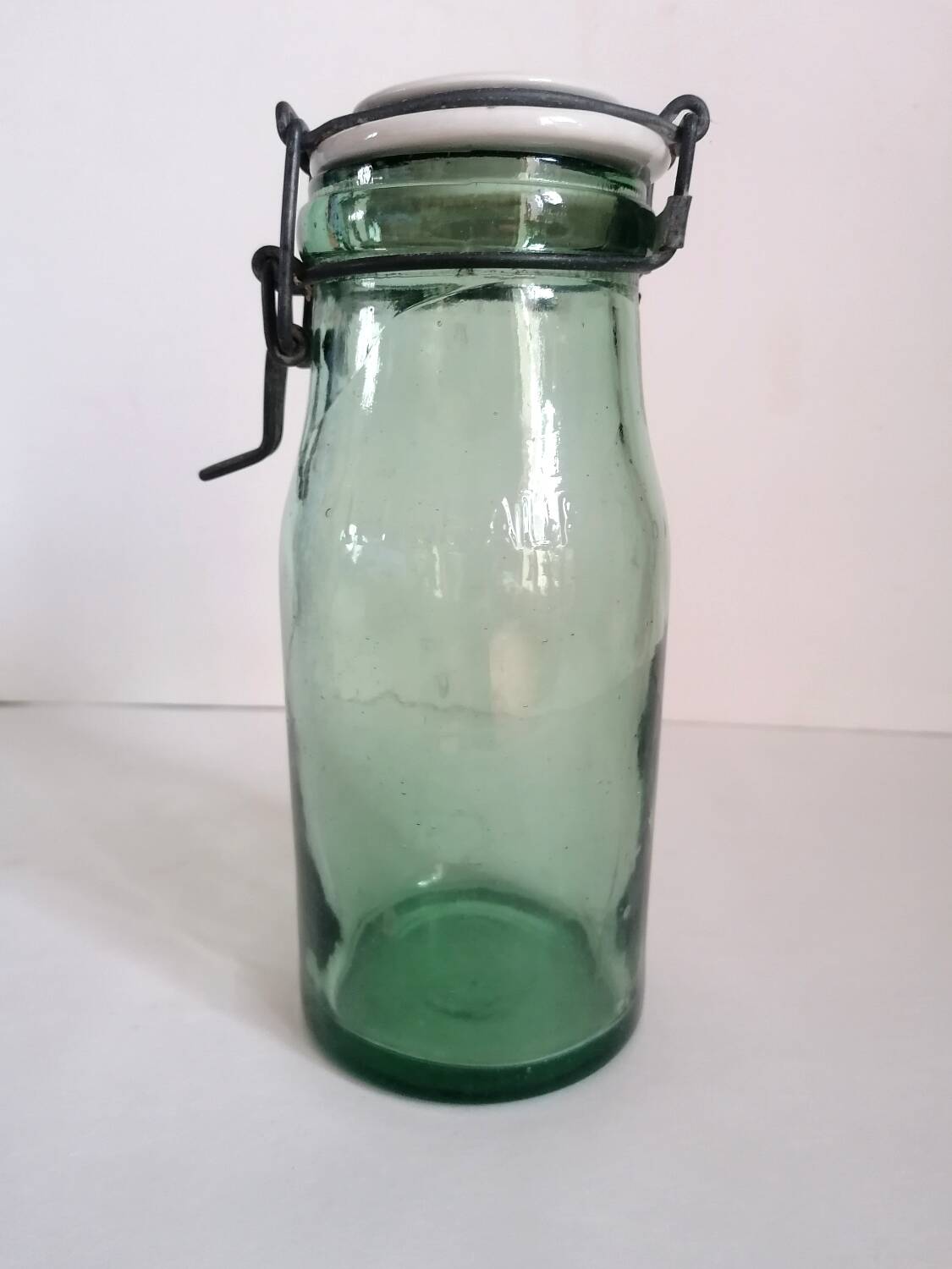 Old jar the ideal green glass