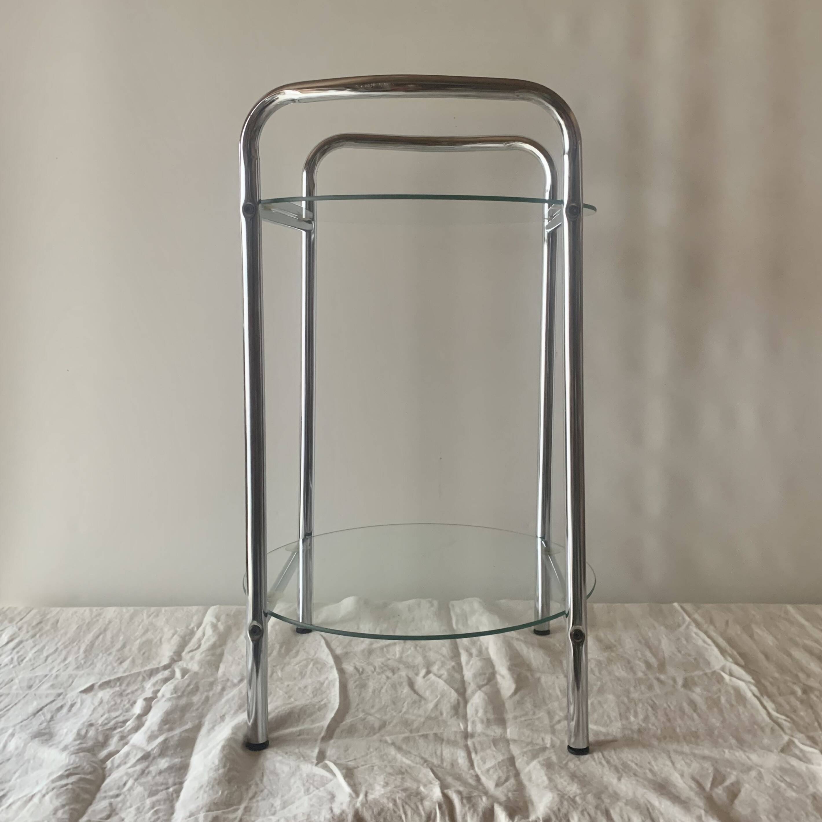 Pedestal table, vintage chrome steel saddle with 2 round windows