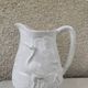 Carafe the heron in white glazed ceramic slipware.