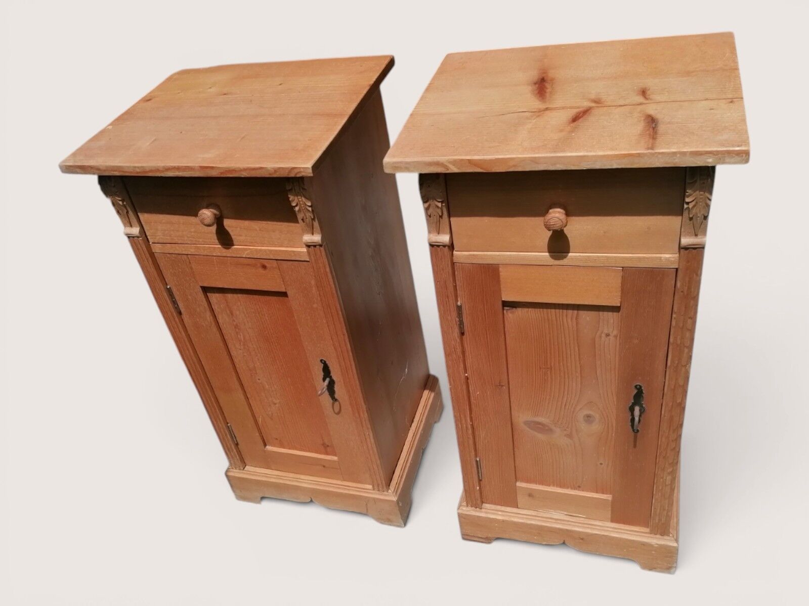 Pair of moulded light wood bedside tables.