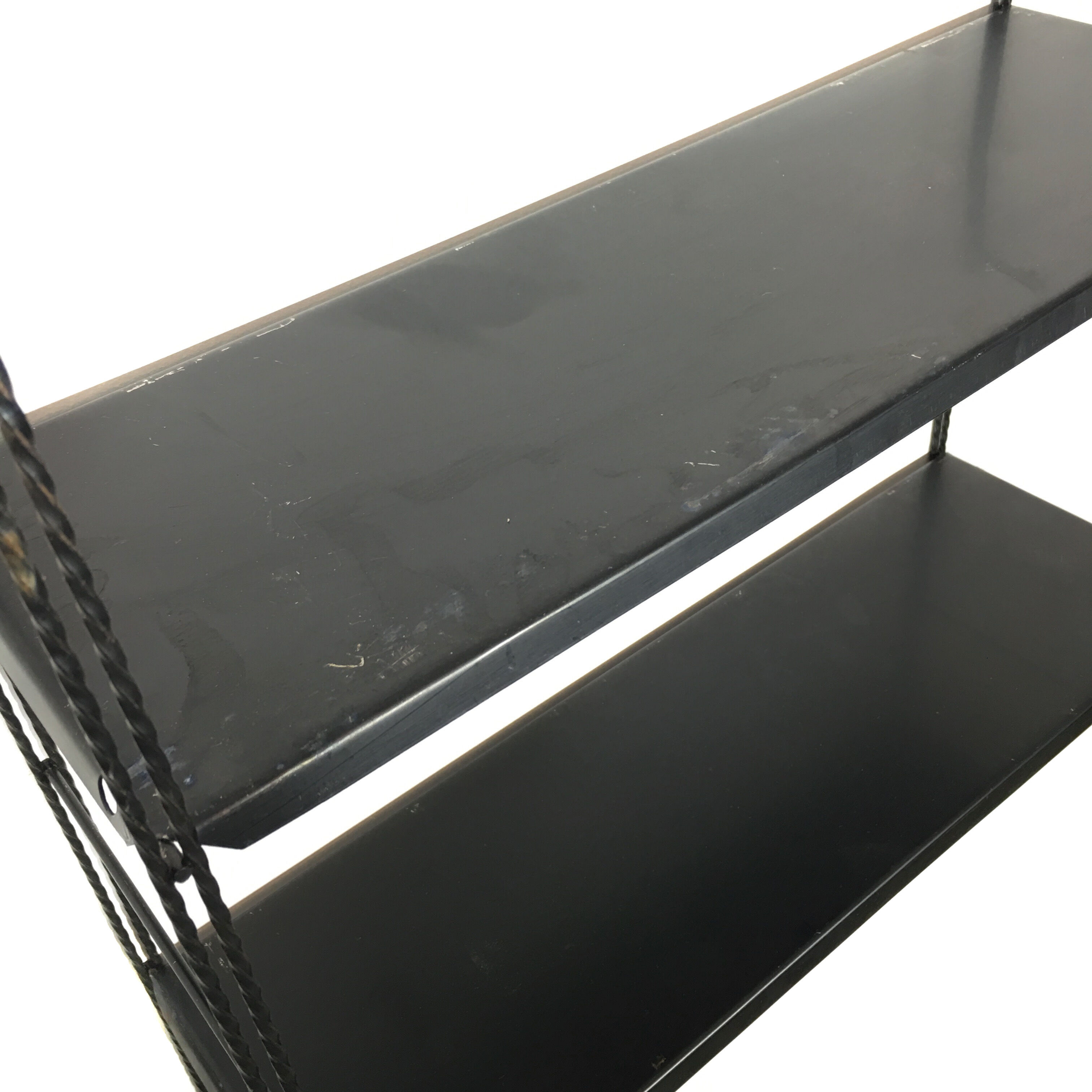 String black metal shelf