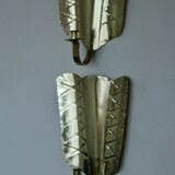 Pair of mid-century Swedish brass shield shape sconces