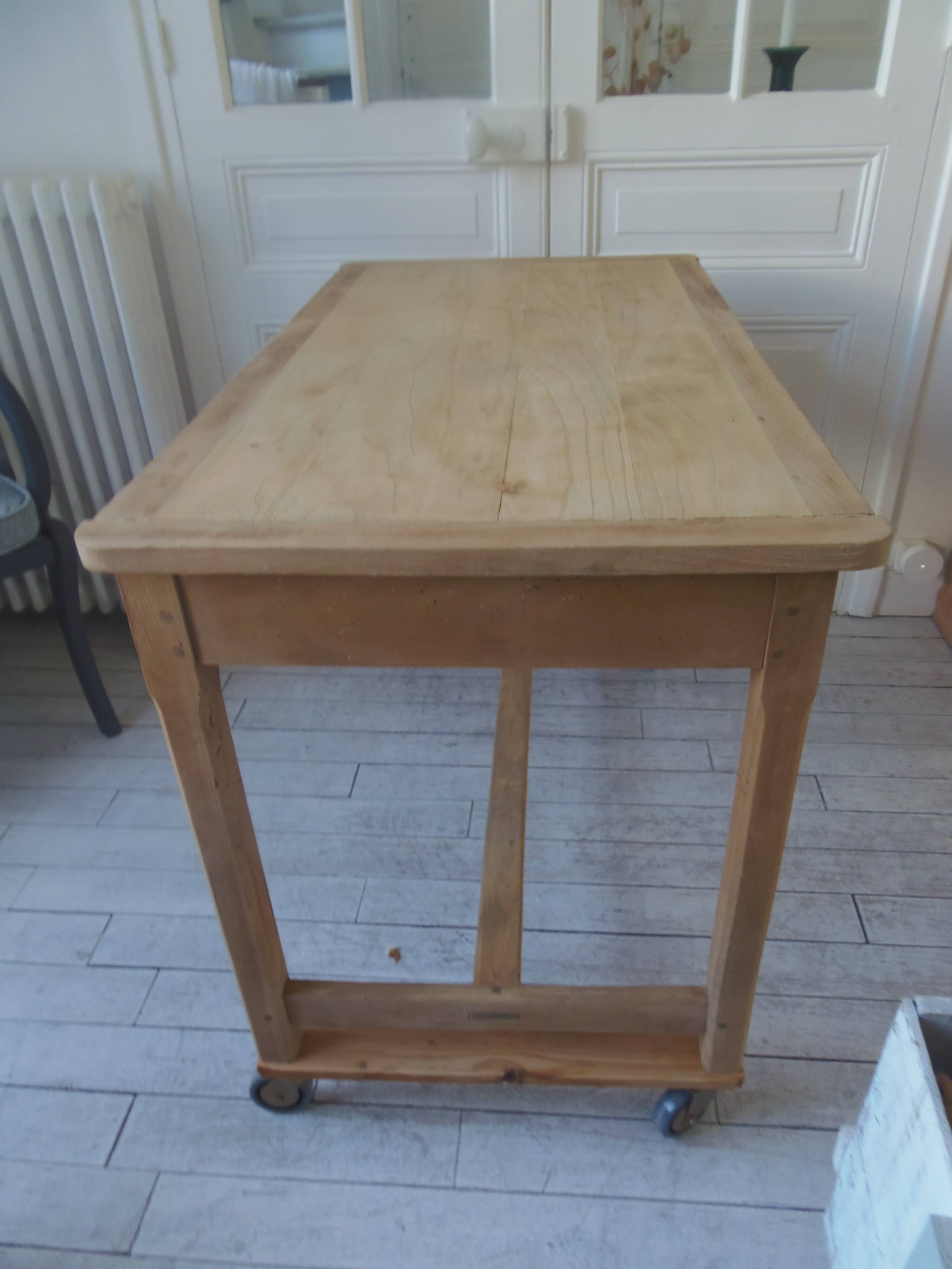 Vintage kitchen table on casters.