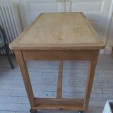 Vintage kitchen table on casters.
