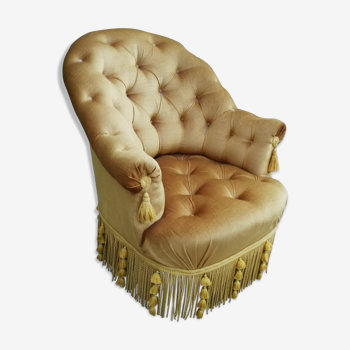 Toad in mustard padded velvet armchair, fringe 60s