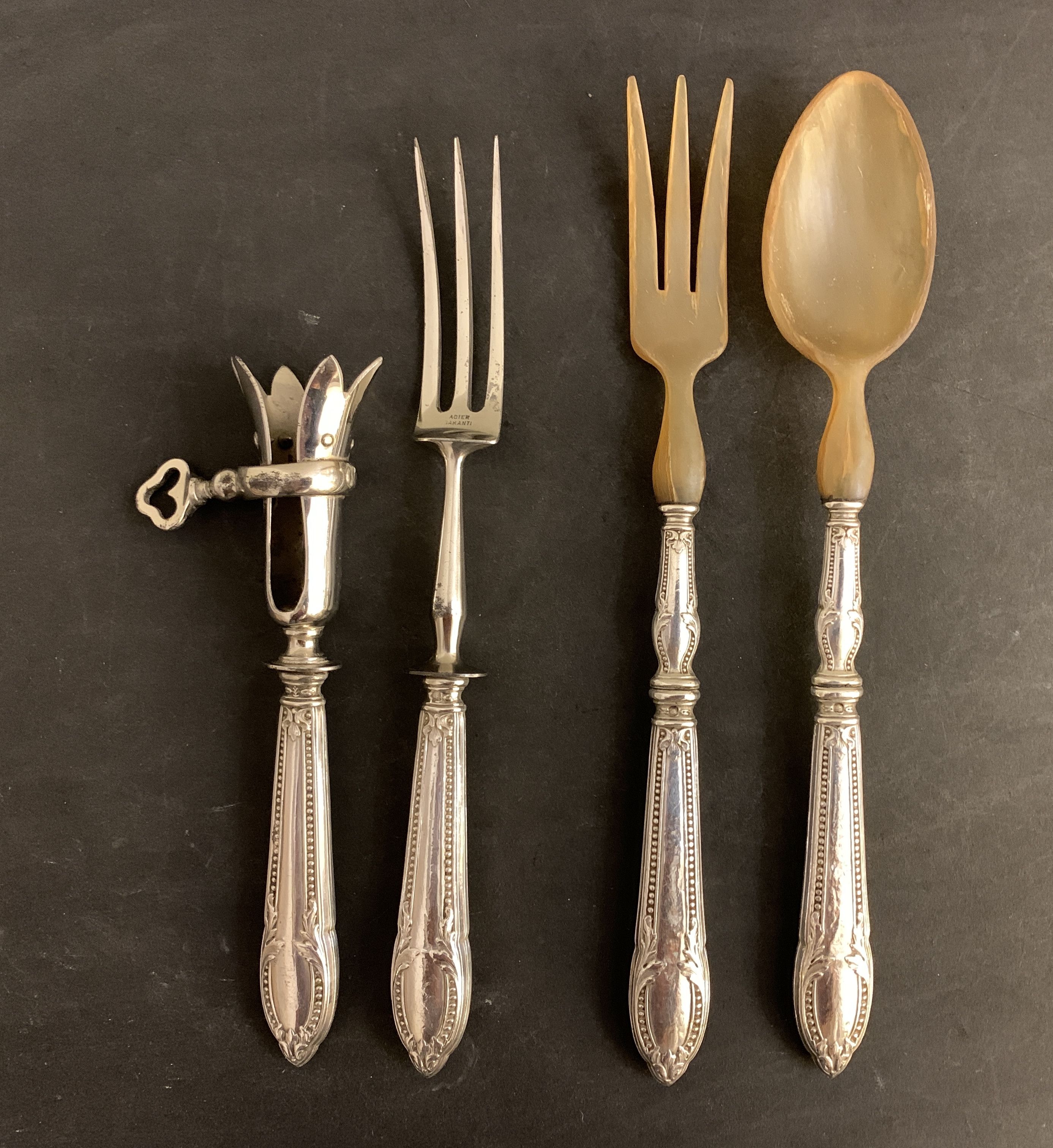 4 couverts de service en argent pour gigot et salade, XIXème