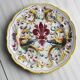 Decorative wall plate in hand-painted earthenware