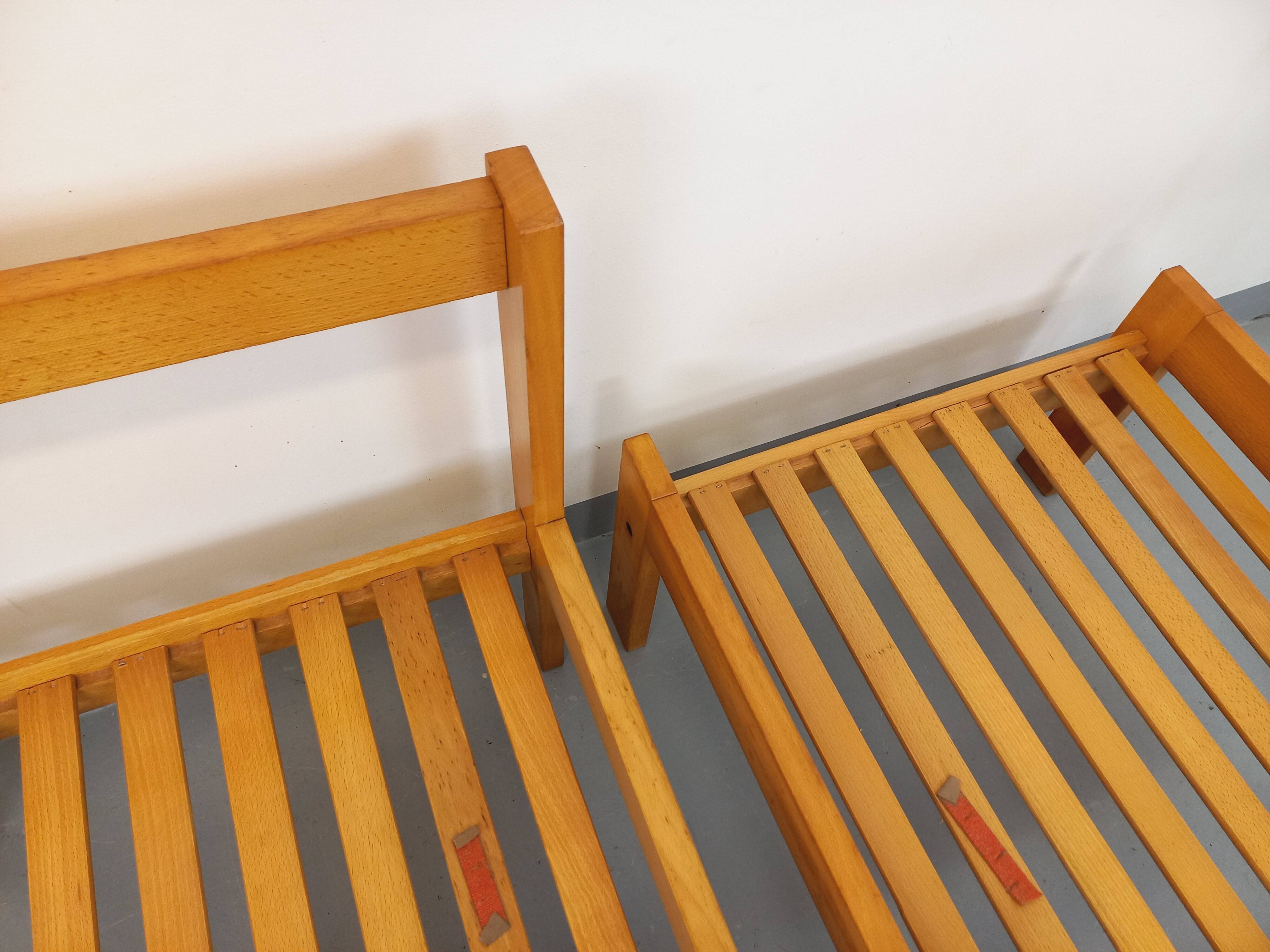 Set of 2 vintage Baumann armchairs in orange fabric and wood from the 80s