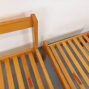 Set of 2 vintage Baumann armchairs in orange fabric and wood from the 80s