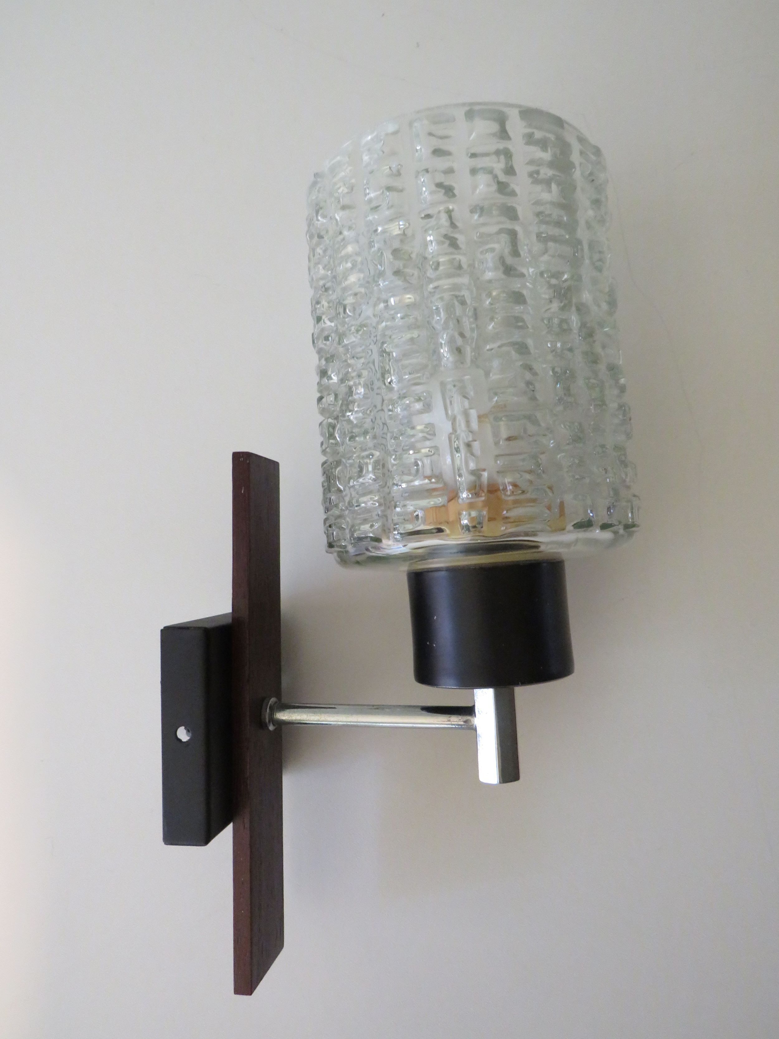 Vintage wall lamp in teak and glass relief Belgium 1970