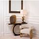 Pair of table lamps in patinated brass and black granite base.