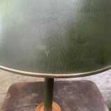 Vintage lamp in imitation green leather