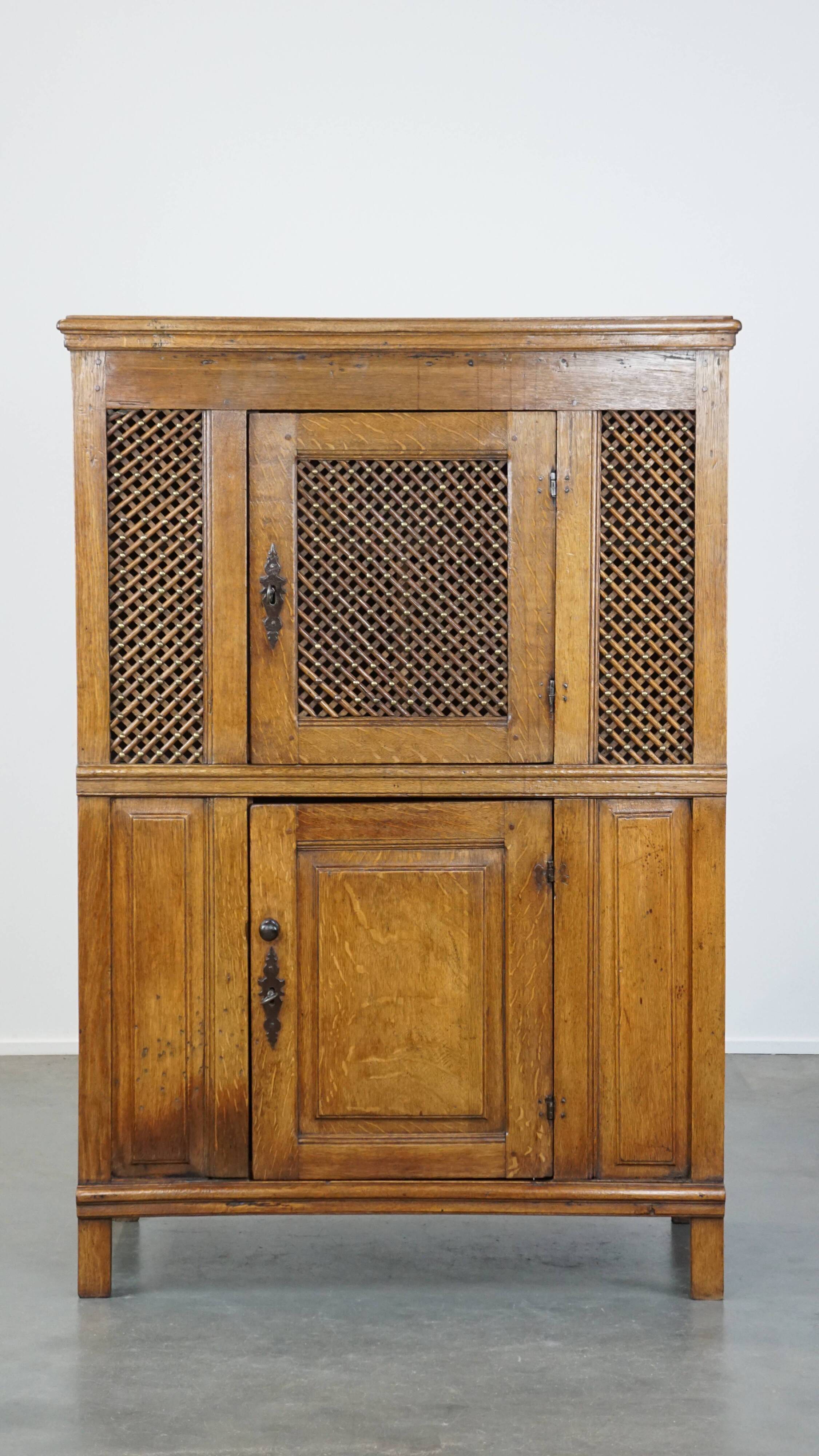 Antique oak bread cabinet from the late 17th century with working locks