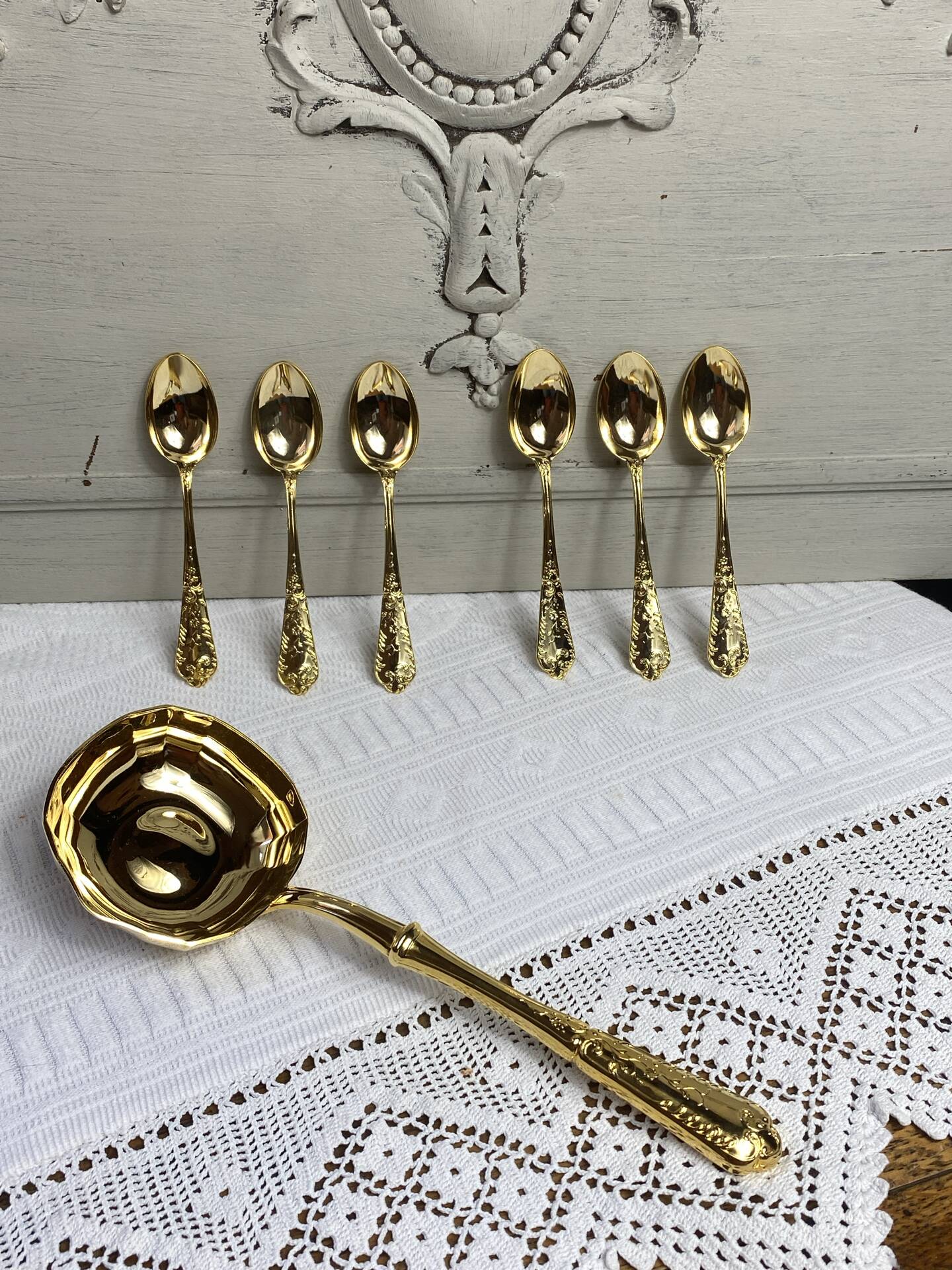Dessert spoons and serving ladle