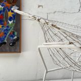 Pair of armchairs in white patinated mesh metal.