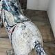 Carved and patinated wooden carousel horse
