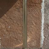 Golden metal selette on marble