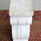 Column pedestal in sculpted Carrara marble