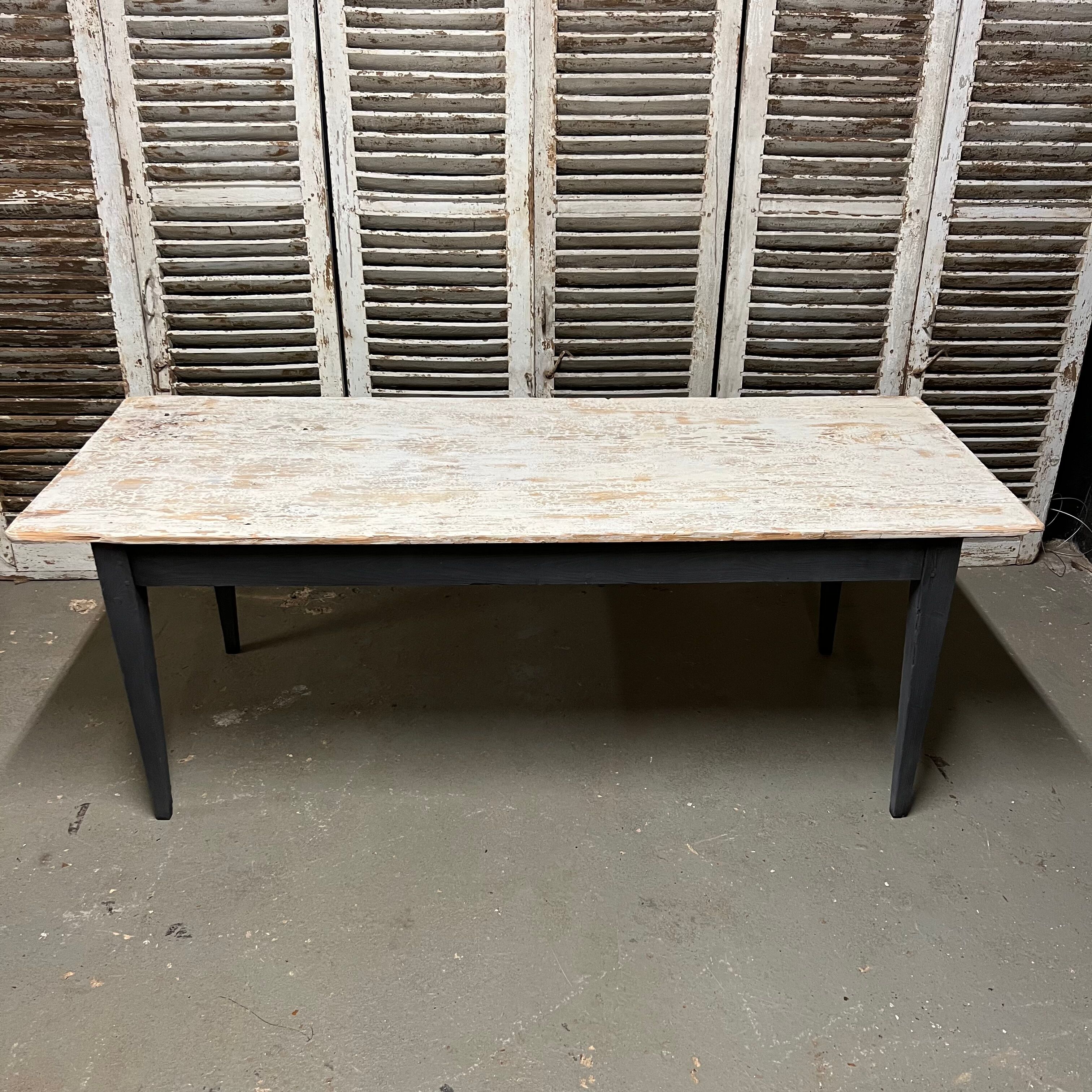 Black farmhouse table and white patinated top