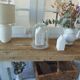 Vintage workbench with pearl gray patinated base and wooden top