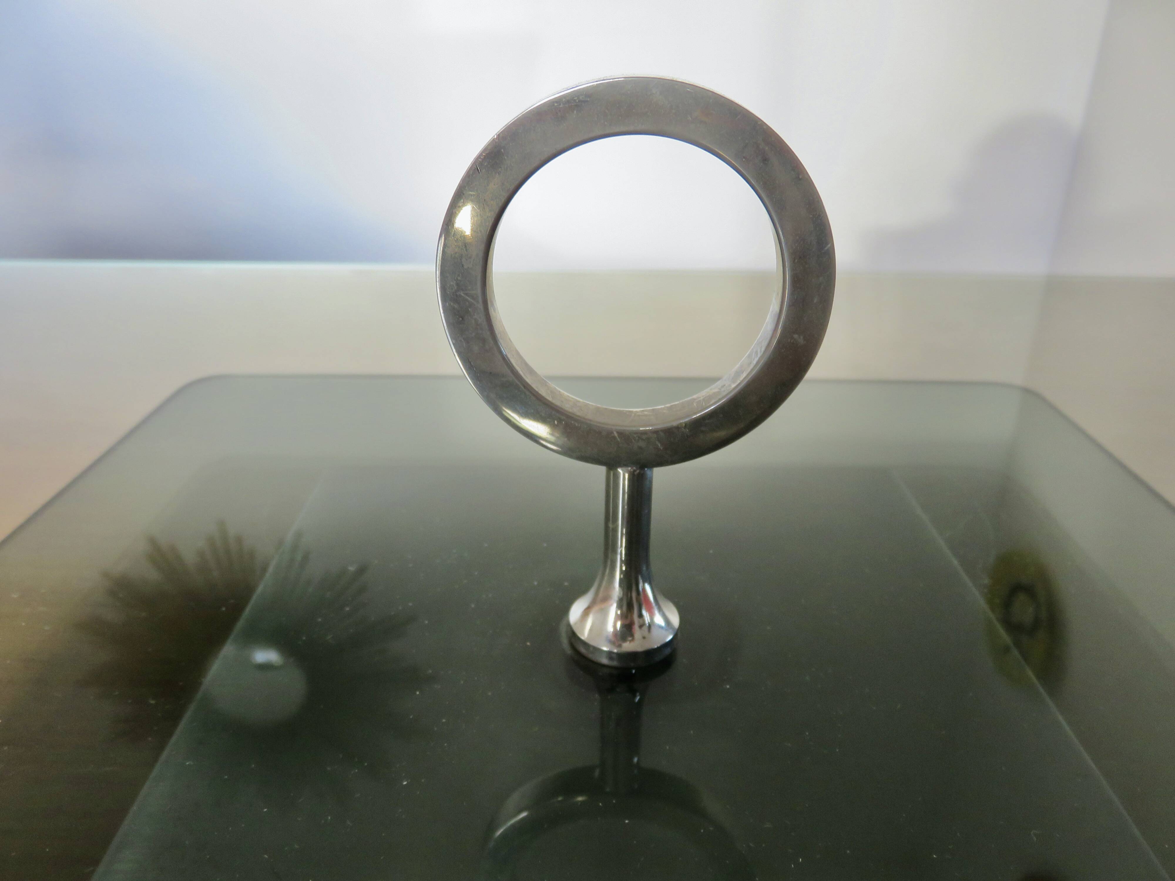 Modernist revolving serving tray, in smoked glass and silver-plated metal, 70.
