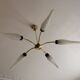 Lustre with 5 branches from the 1960s - 1970s in solid brass and black metal.