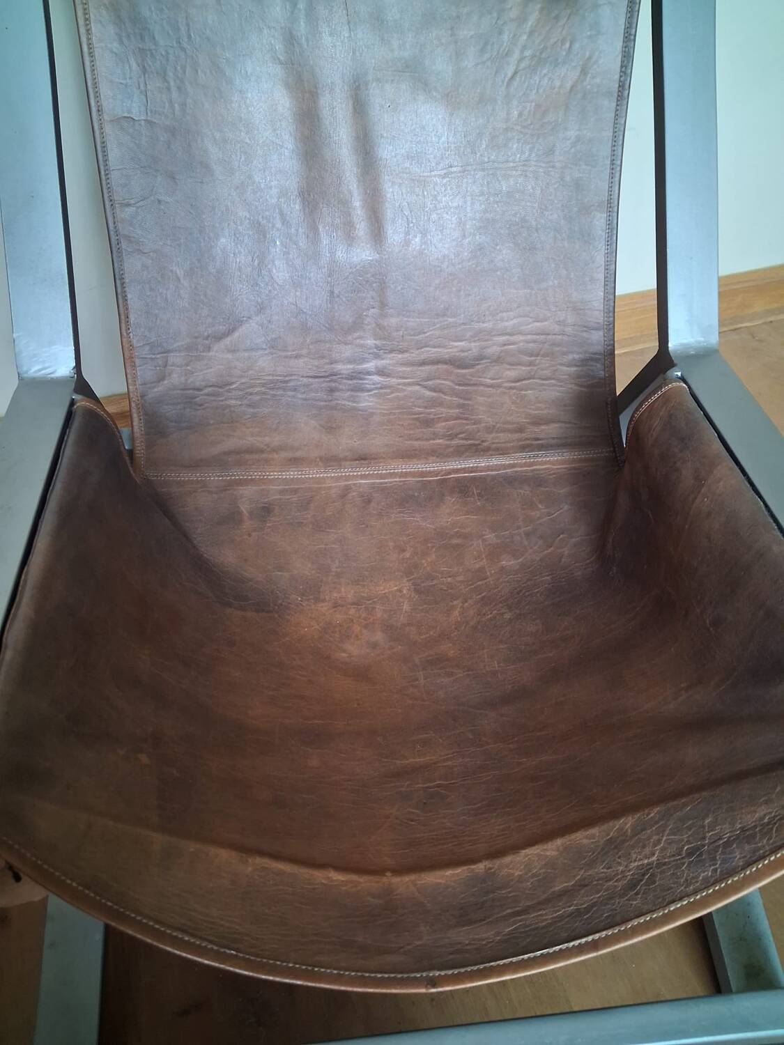 Brown leather armchair, J-Line