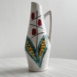 Ceramic flower pitcher.