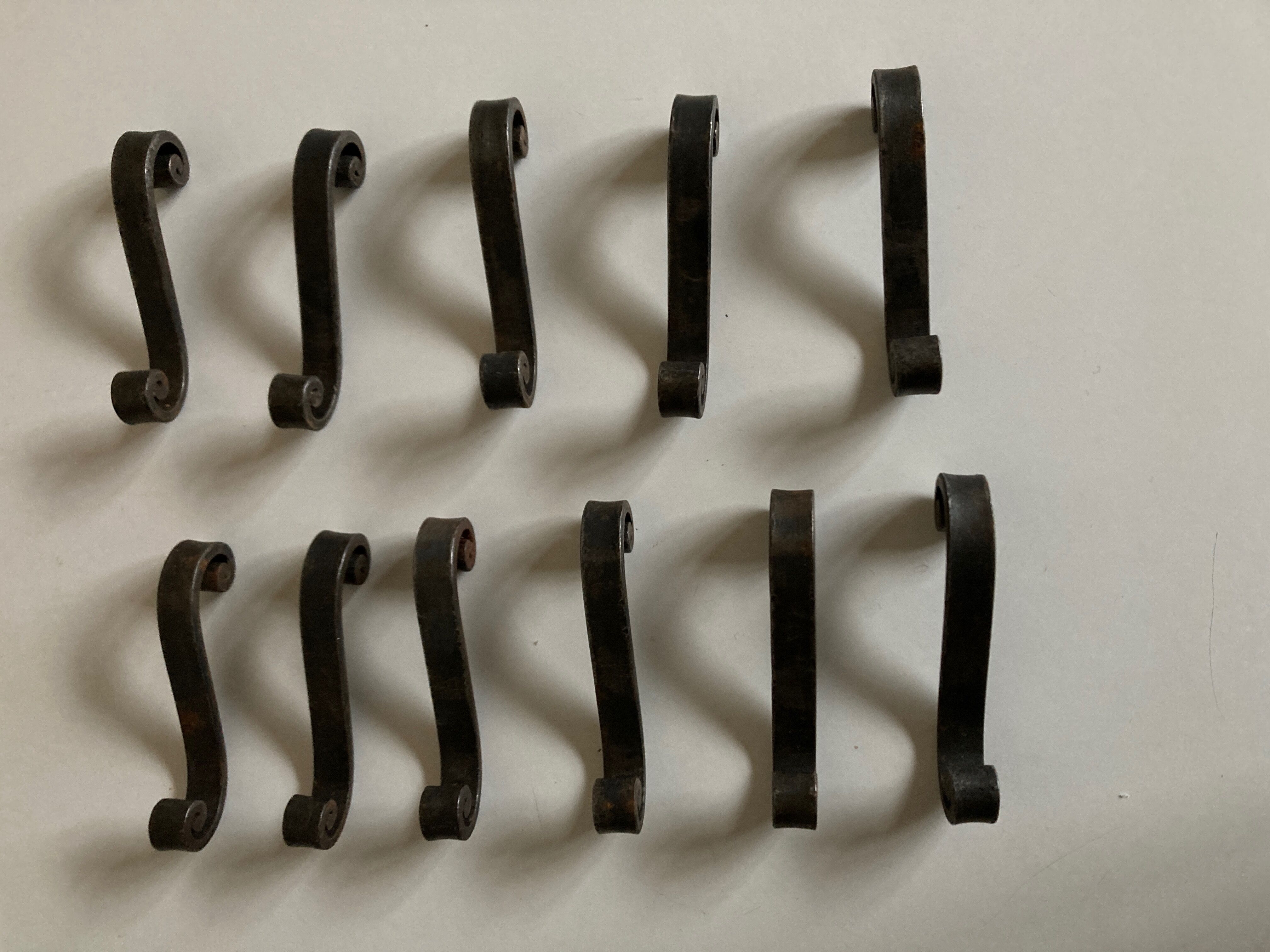 Set of 11 knife holders in beaten iron Provence 1950